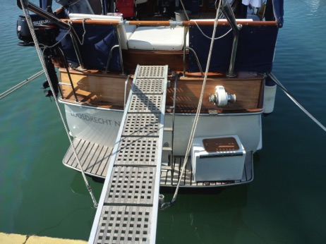 Teak passarelle on chrome davits.